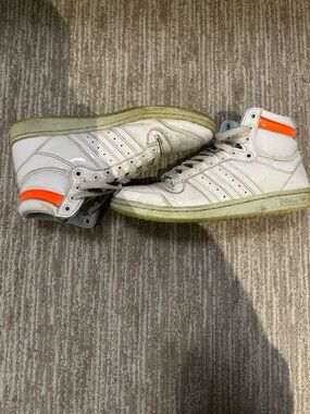 Adidas Trae Young White High-Top Sneakers with Orange Heel Accent